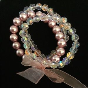 Pink beaded bracelet with bow